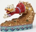 Jim Shore Disney 4046055 Scrooge diving into mone
