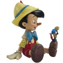 Jim Shore Disney 6011934 Pinocchio and Jiminy Sitting Figurine