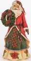 Jim Shore 4046762 Poinsettia Santa Figurine