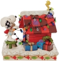 Jim Shore Peanuts 6010322 Snoopy with Woodstock Decorating Dog Figurine