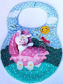 Kubla Crafts Soft Sculpture KUBSFT 8801 Baby Bunny in a Carriage Bib