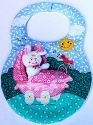 Kubla Crafts Soft Sculpture 8801 Baby Bunny in a Carriage Bib