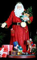 Precious Moments 13601 Santa with Toys and Presents Figurine