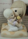 Precious Moments 74003i Celebrate A Mother's Love Book and Figurine