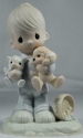 Precious Moments E-3107 Boy Holding Dog and Cat Figurine