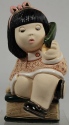 Artesania Rinconada 8 Girl Holding Phone Figurine